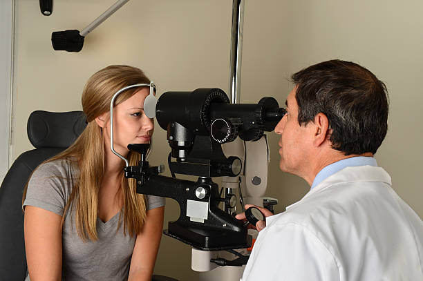 istock Eye Doctor Examining Patient 186110188