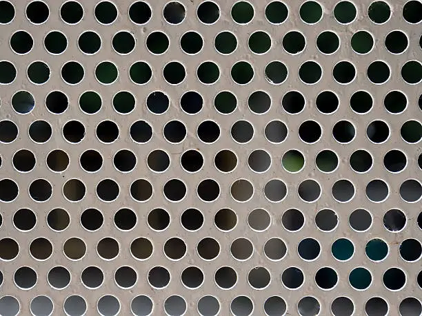 Photo of perforated metal grill vector pattern