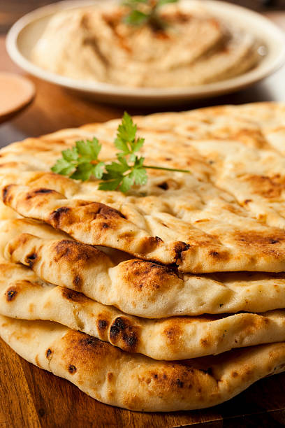 istock Homemade Indian Naan Flatbread 186110330