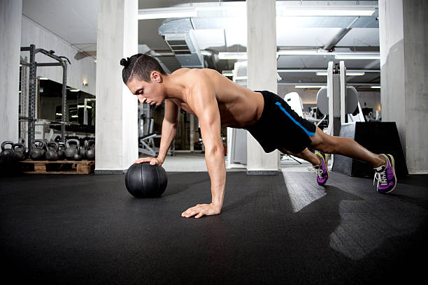 istock Push-up on medicine ball 186111134