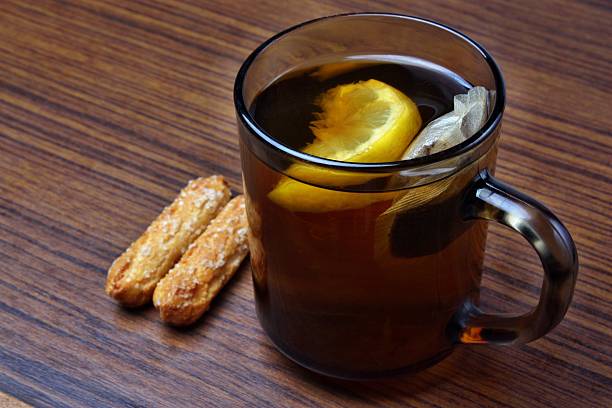 istock Tea with lemon and cookies 186112335