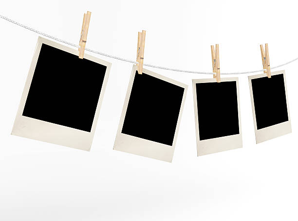 istock Blank photos on a rope weighing 186112339