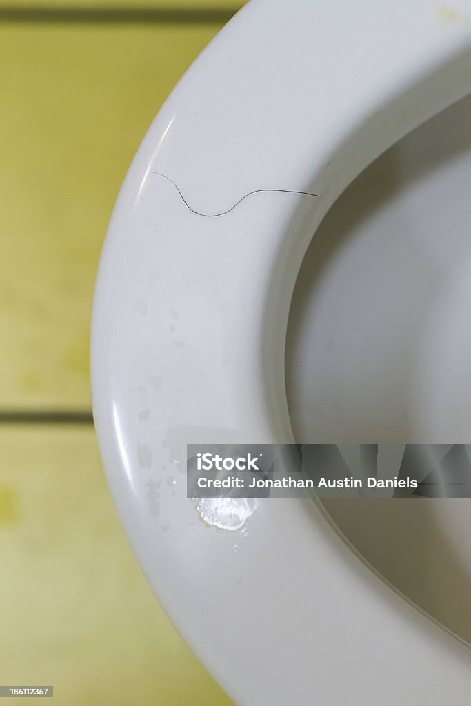 Dirty Toilet Dirty toilet with urine droplets and pubic hair. Bathroom Stock Photo