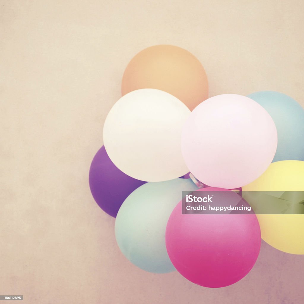 Colorful balloons on wall with retro filter effect Abstract Stock Photo