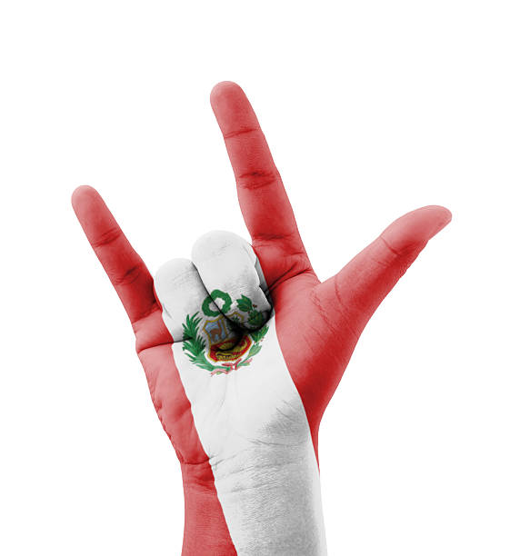 Hand making I love you sign, Peru flag painted stock photo