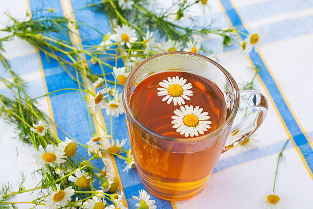 istock Herbal chamomile tea in a glass cup 186113501