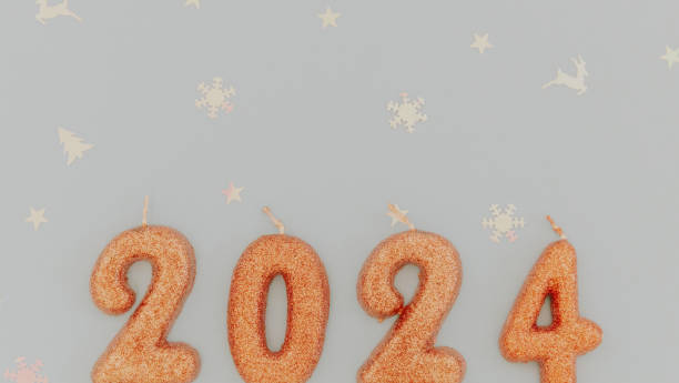 istock Candles numbers 2024 on a blue background. 1861150064