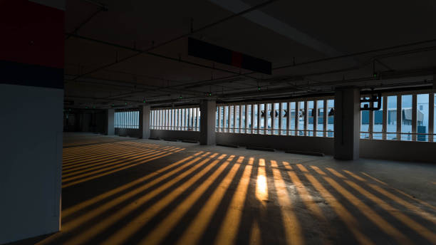 istock building sunset sunrise window architecture light orange yellow colour modern background silhouette dark abstract construction wallhome house apartment futurist tower art room floor system heat style 1861157821