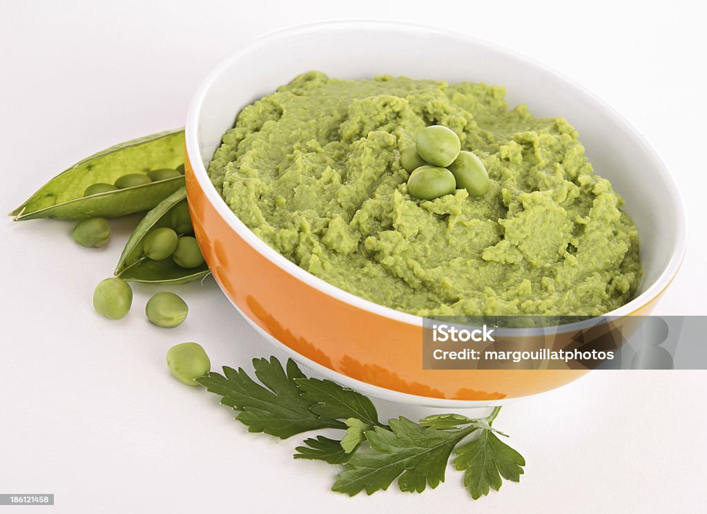 bowl of pea puree Baby Food Stock Photo