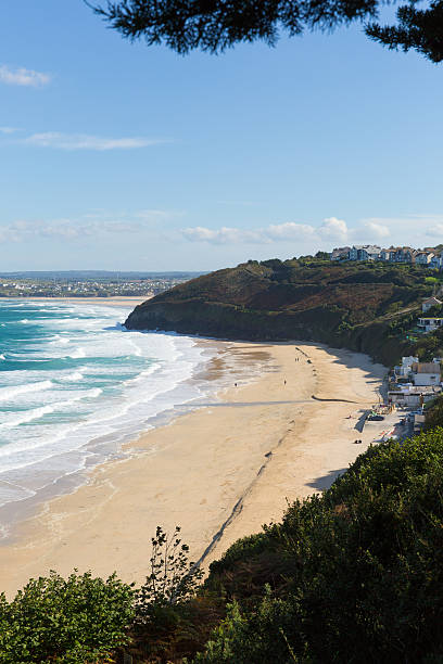 istock Carbis Bay Cornwall England near St Ives with blue sky 186121478