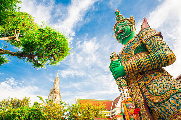 thai giant in the temple with blue sky