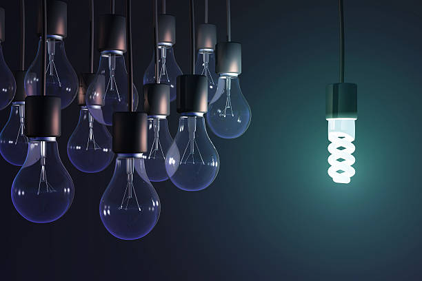 istock energy-saving lamp among the gray bulb 186123299