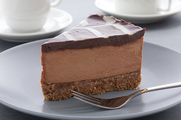 istock Chocolate Cheesecake with three kinds of chocolate. 186123382