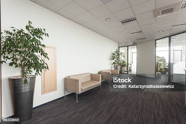 A Large Office Area With Modern Interior Design And Couches Stock Photo - Download Image Now