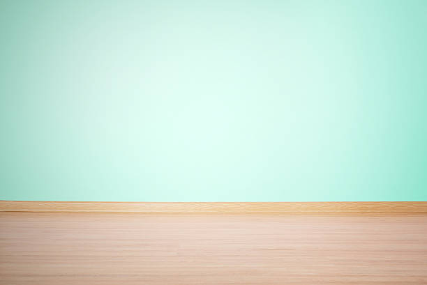 istock background, blank wall and floor in a blue green color 186127441