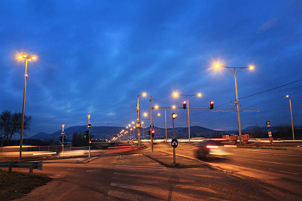 istock Fast moving cars at night 186128398