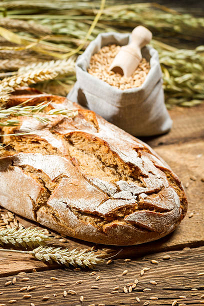 istock Healthy bread and a bag with grains 186128417