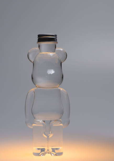 istock Plastic teddy bear bottle with food coloring and strange lighting effects shapes and textures 1861292387
