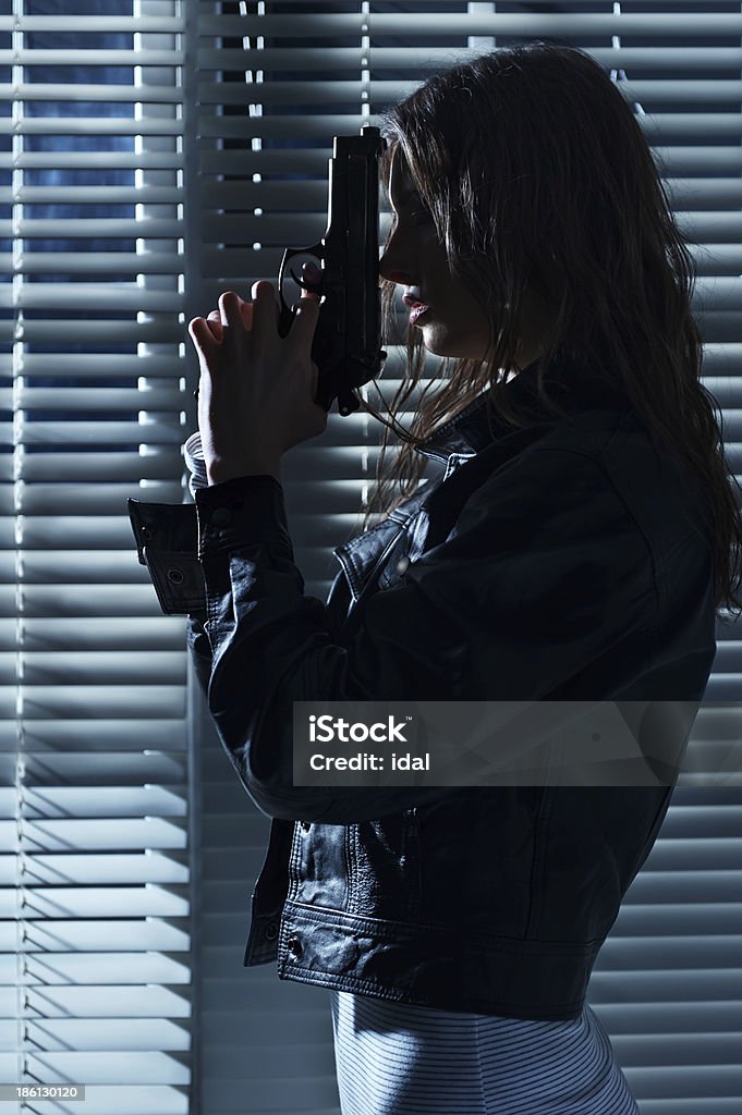 Retrato de una chica con arma - Foto de stock de Adulto libre de derechos