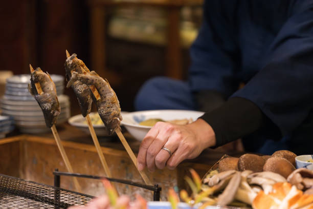 istock Fish being grilled on the hearth Close-up 1861303209