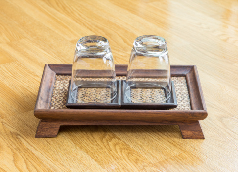 Glass on wooden tray at a spa