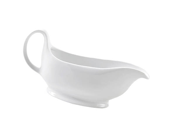 istock Ceramic cream jug isolated on white background 186131286