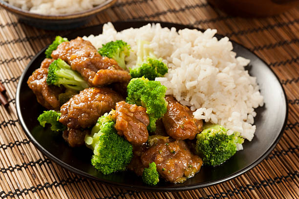 Homemade Asian Beef and Broccoli Homemade Asian Beef and Broccoli with Rice chinese food stock pictures, royalty-free photos & images