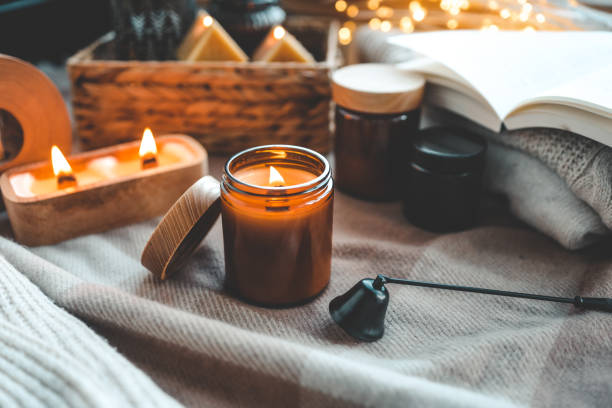 istock Burning candle in a festive cozy interior 1861329928