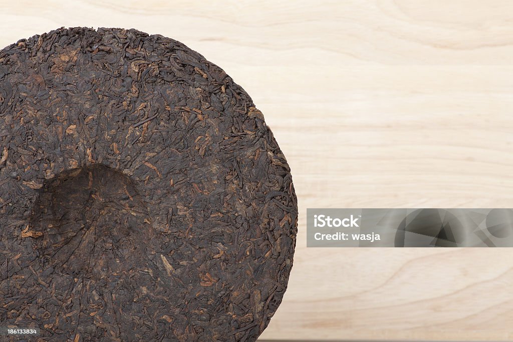 Disque de puer thé sur fond en bois - Photo de Antioxydant libre de droits