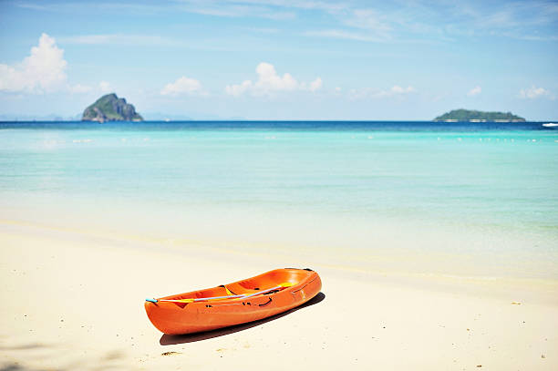 Orange canoe on the beach. Phi-Phi Island, THAILAND stock photo