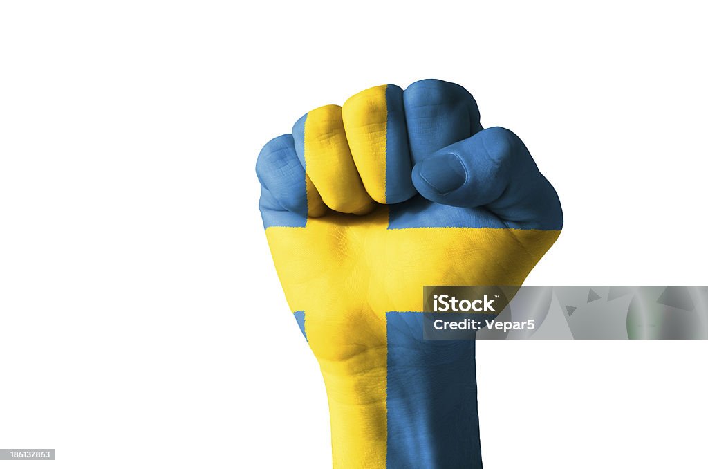 Pugno verniciato nei colori della Bandiera della Svezia - Foto stock royalty-free di Bandiera