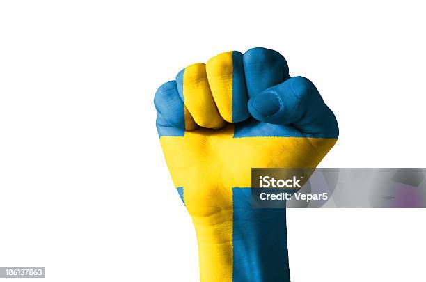 Foto de Punho Pintados Com As Cores Da Bandeira Da Suécia e mais fotos de stock de Bandeira - Bandeira, Colorido, Cultura sueca