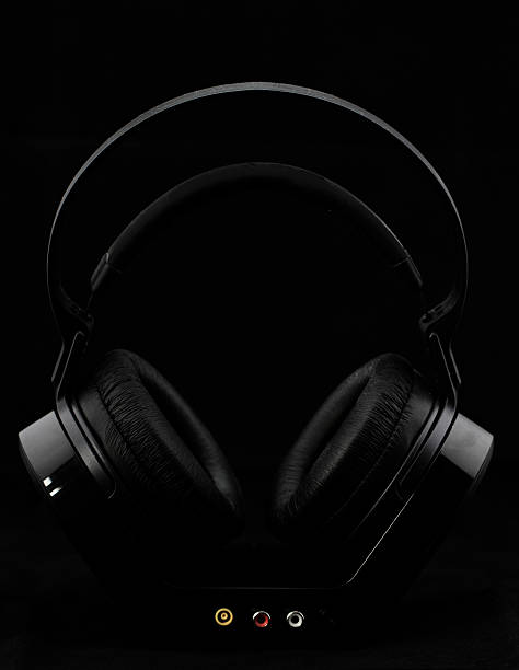 istock Headphones on black background 186138277