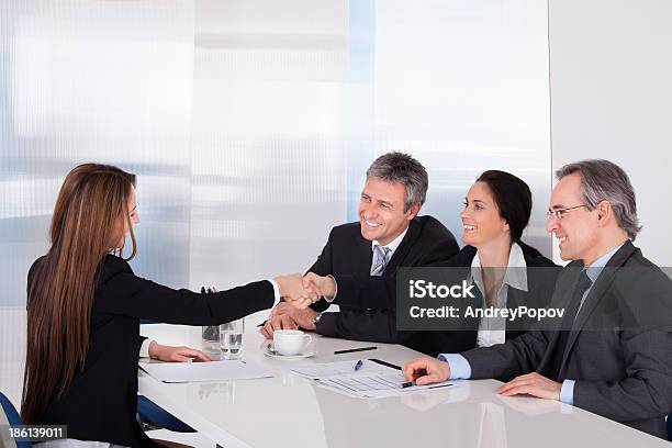 Two Businesswomen Shaking Hand Stock Photo - Download Image Now - Active Seniors, Adult, Agreement