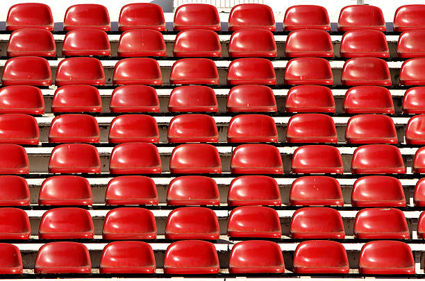 istock amphitheater stadium with red seats 186140603