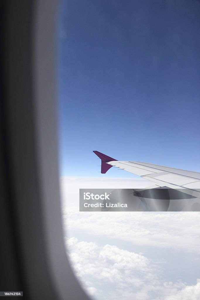 Vista desde la ventana - Foto de stock de Ala de avión libre de derechos