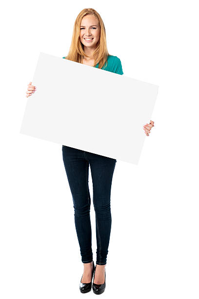 istock Attractive woman holding a blank sign 186142254