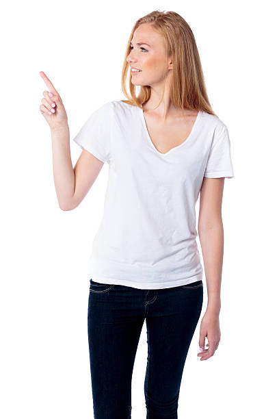istock Woman pointing and looking at copyspace 186143289