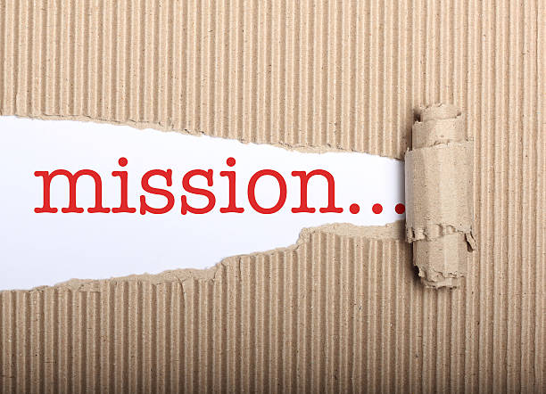 istock Mission text on paper and torn cardbox 186144567