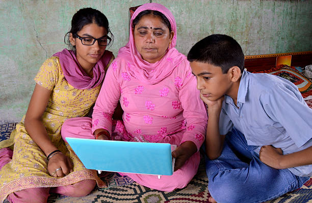 istock Women Holding Laptop 186144688