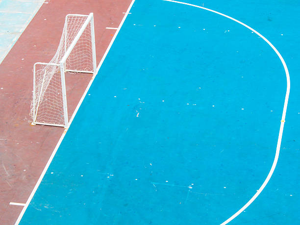 istock football or futsal concrete ground 186146012