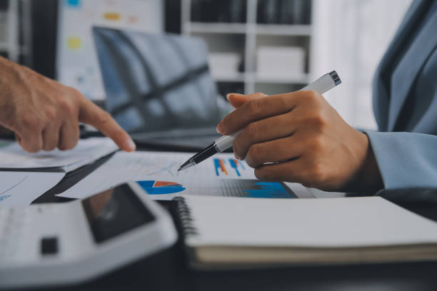 istock Financial Business team present. Business man hands hold documents with financial statistic stock photo, discussion, and analysis report data the charts and graphs. Finance Financial concept 1861463347