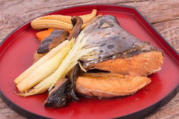 Salmon Kabutoni Japanese food on wooden background