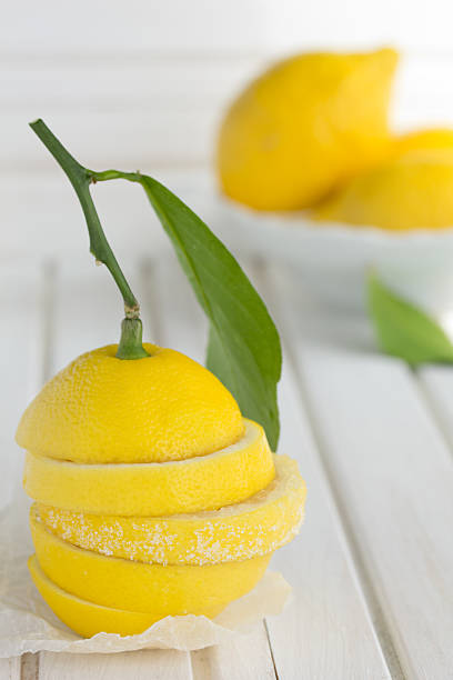 istock Slices of lemon on a blue background. 186149396