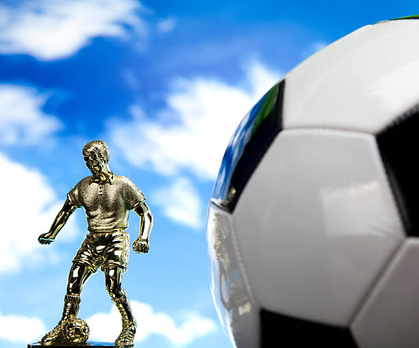 istock Classic black white soccer ball 186149719