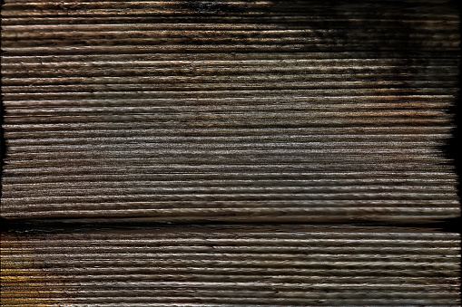 Abstract retouched dark brown woodgrain texture with fine horizontal knots.