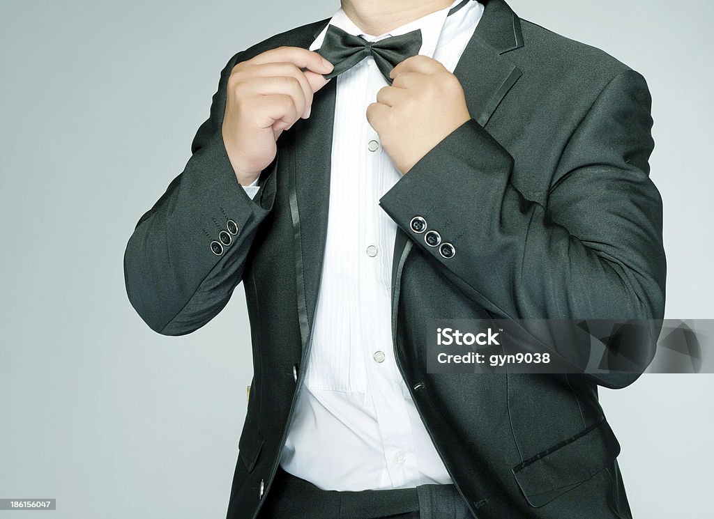 Uomo indossare una tuta - Foto stock royalty-free di Completo