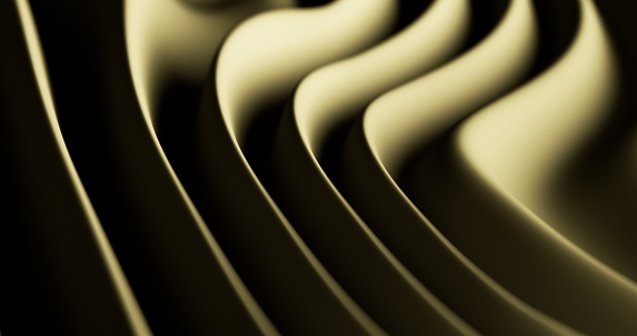A detailed view of waves in matte golden plastic