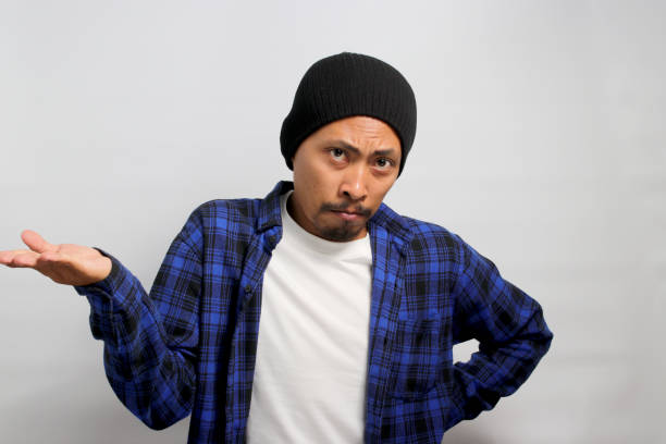 istock Asian man is shrugging his shoulders 1861600207