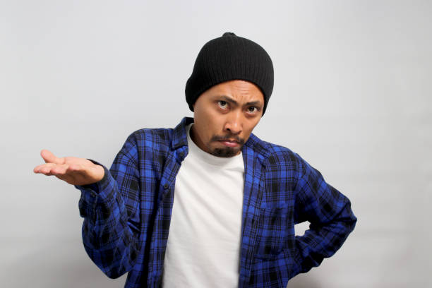 istock Asian man is shrugging his shoulders 1861602306